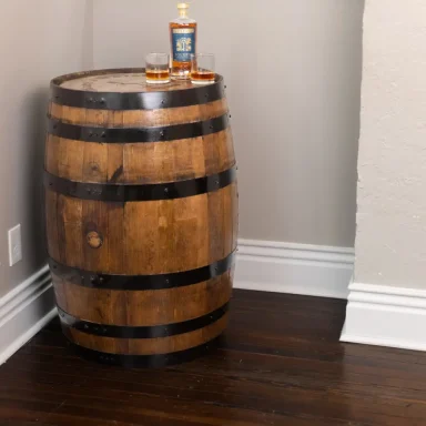 Whiskey barrel with dark stain and metal bands painted black