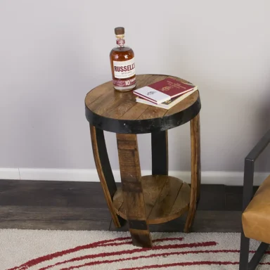 Top view of miniature barrel end table with shelf featuring metal accents.