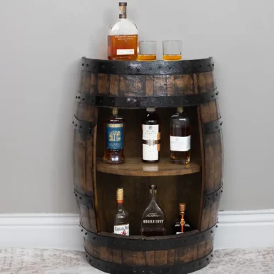 half barrel cabinet with oak shelving and liquor bottles inside